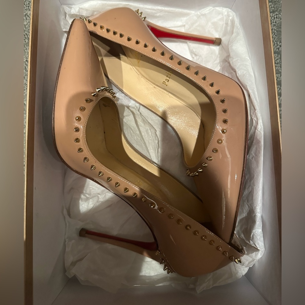 Christian Louboutin - Size 6.5 Red Bottoms